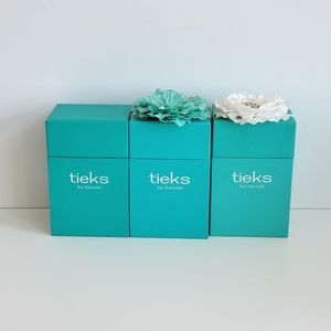 3 Empty Tieks boxes